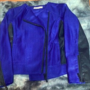 MK royal blue leather on sleeves